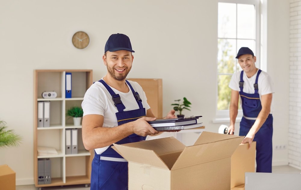 two,professional,friendly,movers,from,cardboard,boxes,unpacking,office,items